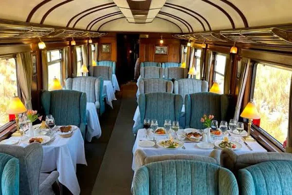 Dining car on the PeruRail Titicaca train where lunch is included in the Cusco to Puno ticket price