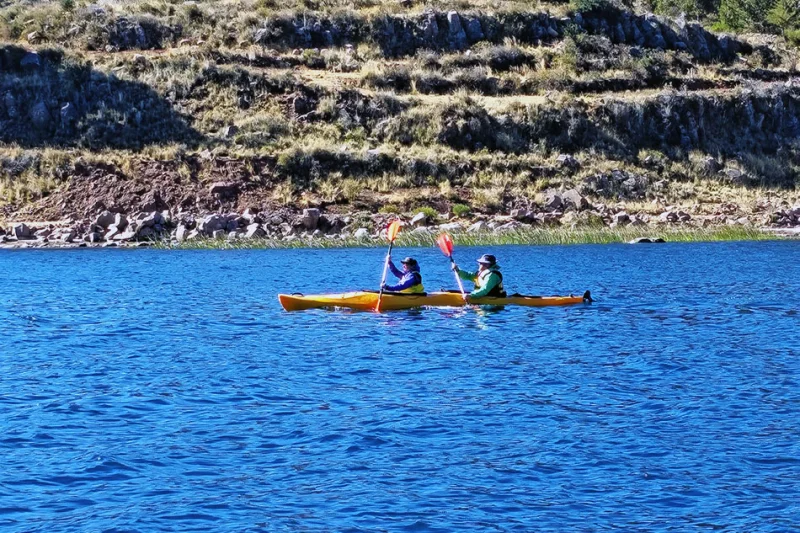 Kayaking on Lake Titicaca near Llachon with the islands in the distance